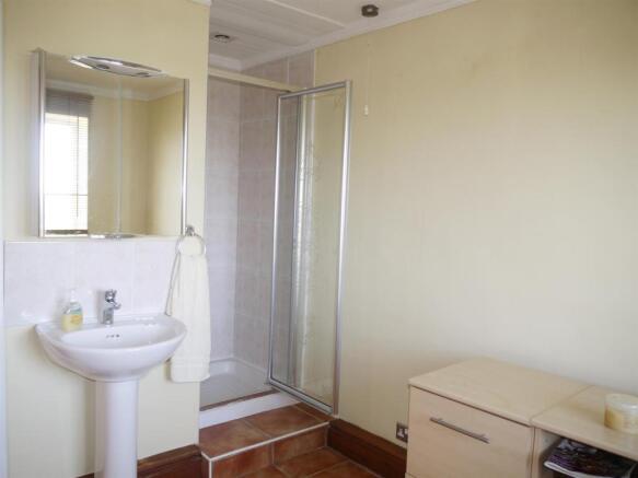 BEDROOM THREE/SHOWER