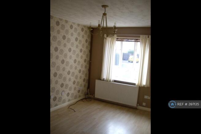 Lounge Area With Central Heating And Feature Wall