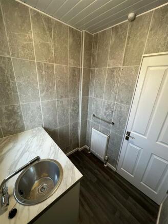 REFITTED UTILITY ROOM