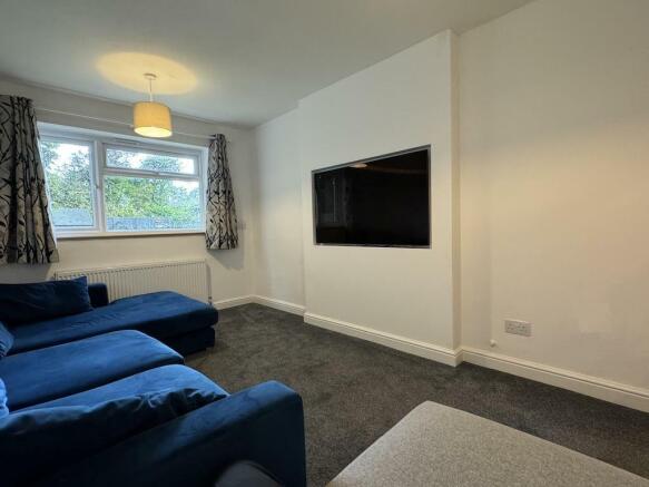 8 - Lounge TV wall.jpg