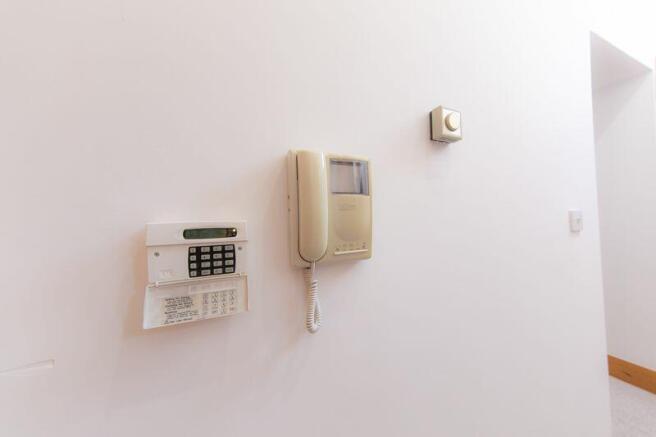 Intruder alarm and intercom system