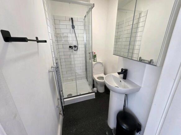 A modern and well-maintained bathroom featuring...