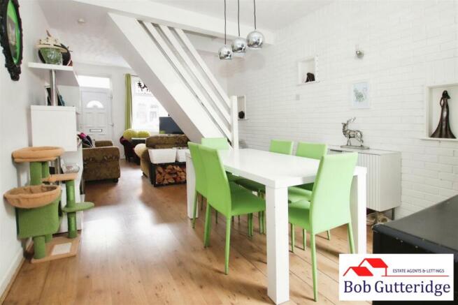 THROUGH LOUNGE/DINING ROOM