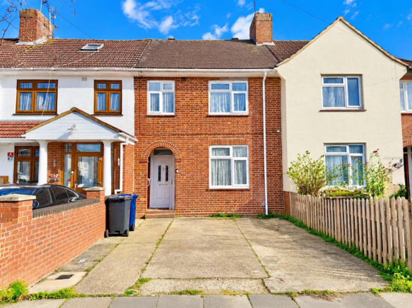 Sunlit Terraced Houses in Blue Skies.png