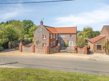 Detached Home Framed by Open Countryside in Weasenham