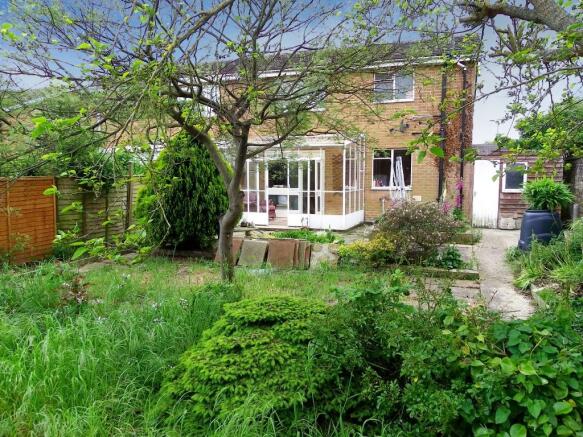 Rear garden to house