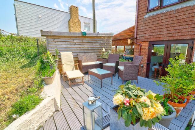 Decked terrace overlooking fields
