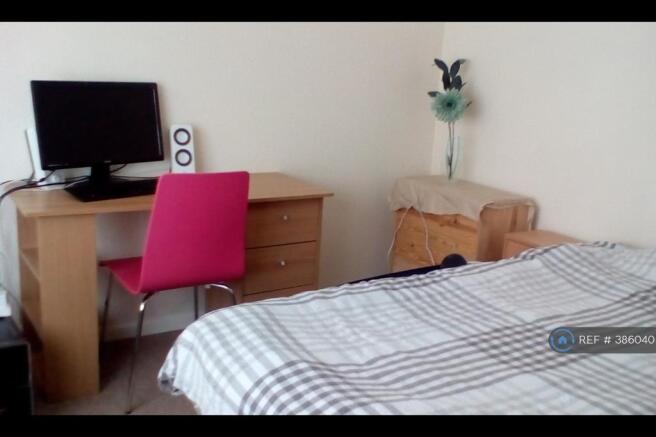Double Bedroom With Pink Chair!!!