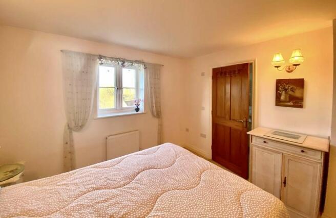 Bedroom with ensu...