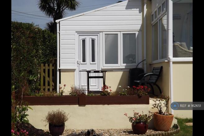 Workshop And Raised Patio