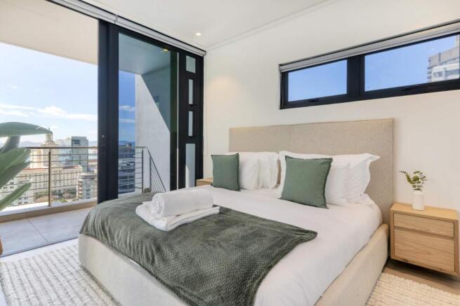 Bedroom open up onto private balcony