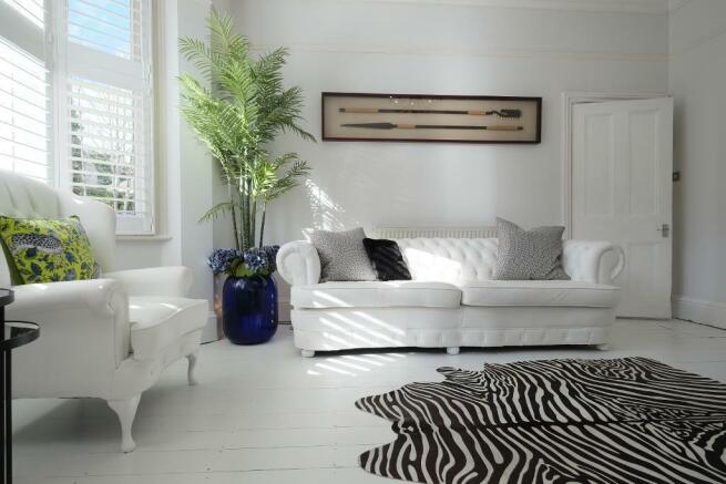 Family/TV room with log burner