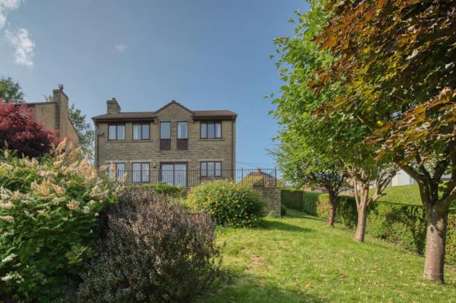 Rear of the home, from bottom-right of garden.jpg