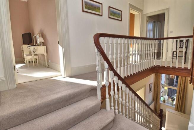 FIRST FLOOR SPLIT LEVEL LANDING