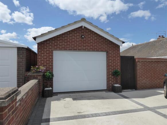 DETACHED BRICK GARAGE