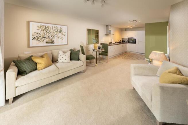 a living room with white couches