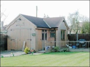 TIMBER OUTHOUSE