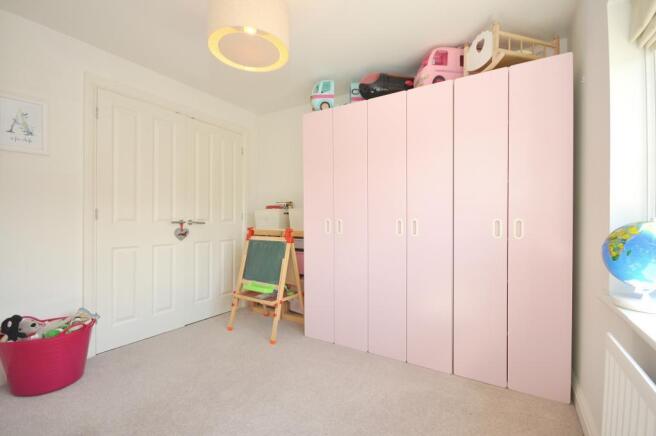 Bedroom two with built in wardrobes
