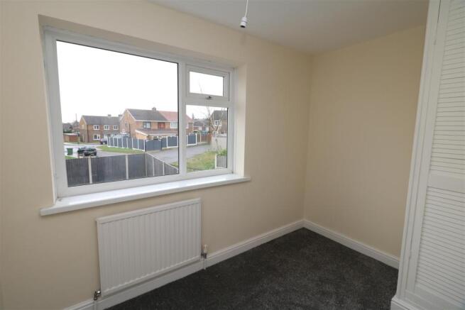 REAR BEDROOM