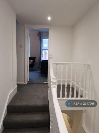 First Floor Hallway Into Living Room