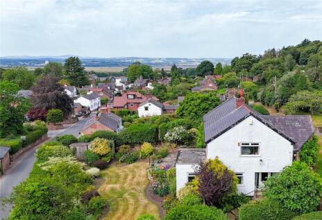 The Village, Burton, Neston