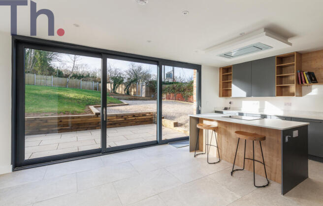 Direct Garden Views from Triple Track Doors