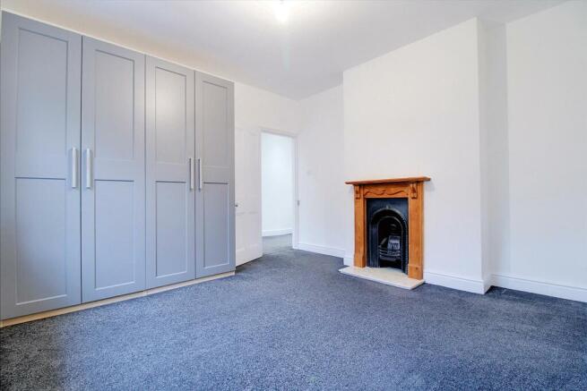 Bedroom Two Fire Place.JPG