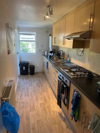 Bright kitchen with ample cabinet storage...
