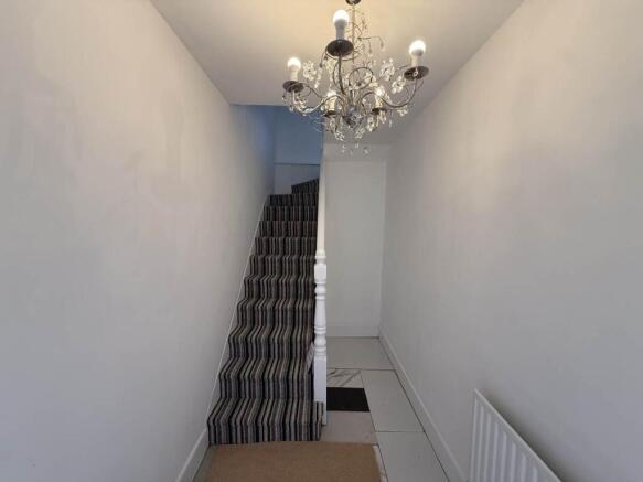 ENTRANCE HALL AND ST