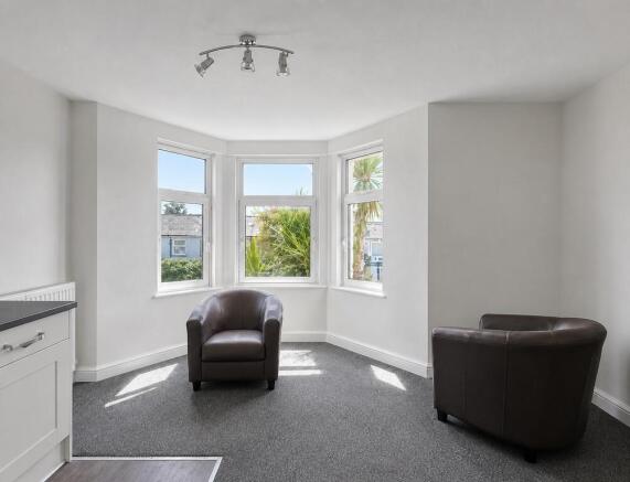 Bright, spacious room with lovely bay windows...
