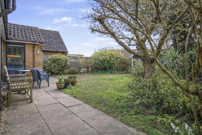 Garden retreat with rustic charm.jpg