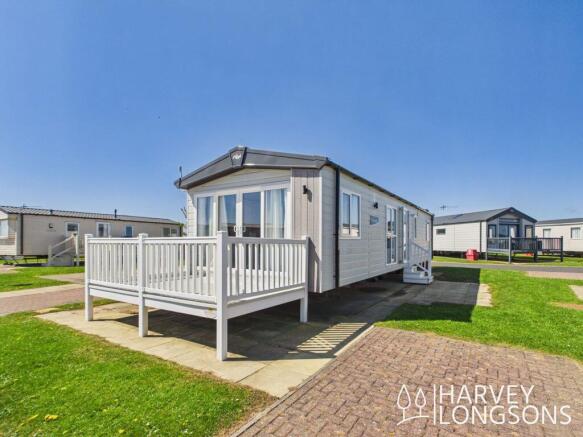Regal Charmouth holiday home exterior with decking