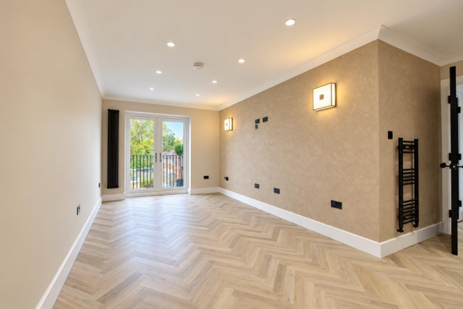 Minimalist Beige Room with French Doors.png