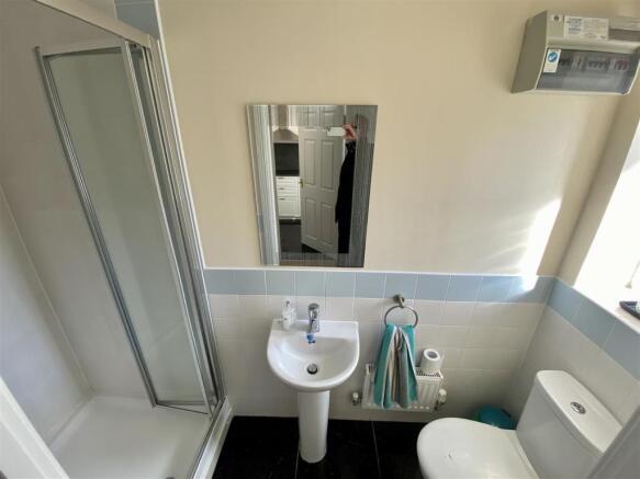 CLOAKROOM/SHOWER ROOM