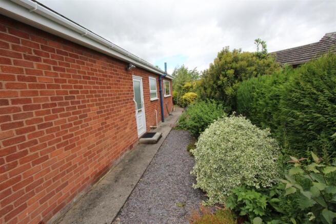 Entrance Porch and Side of Property.JPG