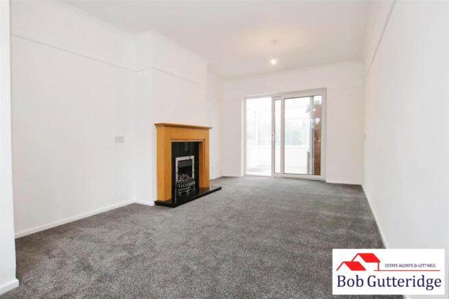 THROUGH LOUNGE / DINING ROOM