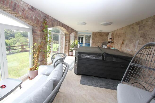 Indoor/Outdoor Room with Hot Tub