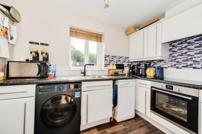 KITCHEN AND DINER/LIVING ROOM