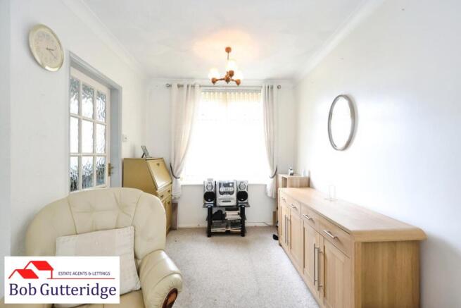 THROUGH LOUNGE / DINING ROOM