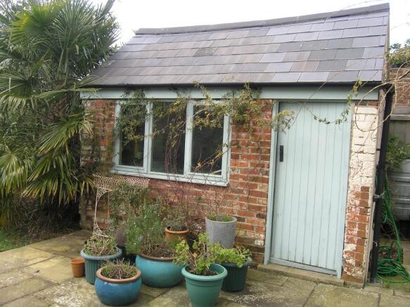 1 of 2 matching outbuildings