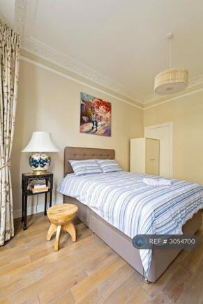 Charming Bedroom With Kingsize Bed