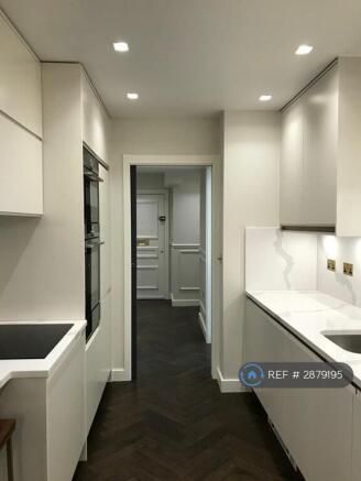 Kitchen And Hallway 