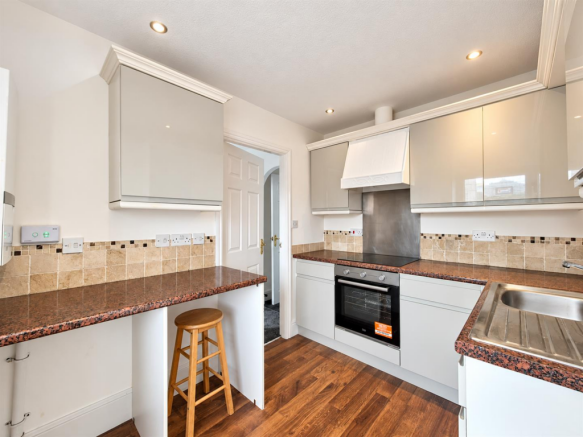 Clean Modern Kitchen Interior.png