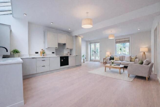 Open plan living area with wooden floor