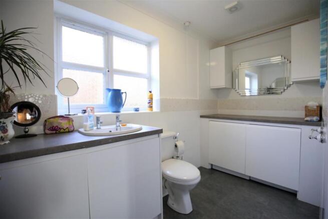 UTILITY ROOM & CLOAKROOM