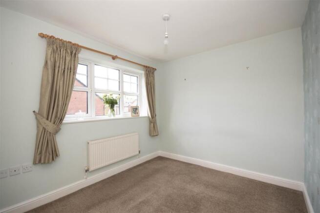 FIRST BEDROOM