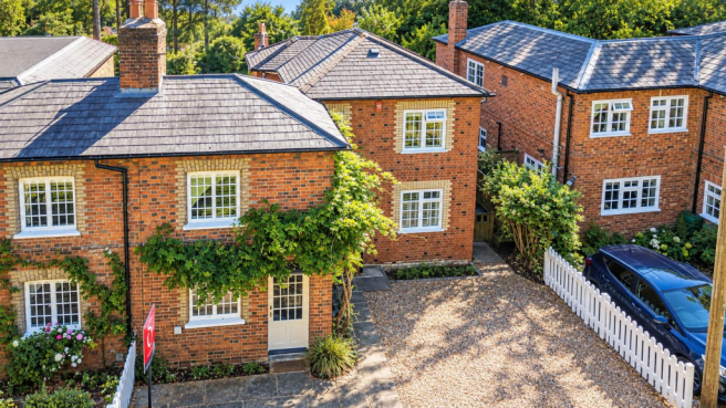 Sunlit English Brick Cottage Complex.png