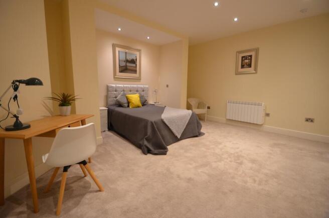 7. Bedroom One-min