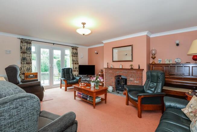 Sitting room with double doors on the rear garden