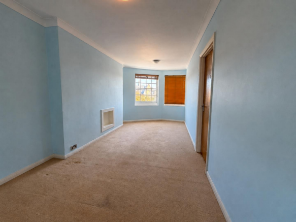 Serene Blue Hallway with Bay Windows.png